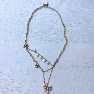 Gold-Tone Pink Bow Three-Row Pendant Necklace